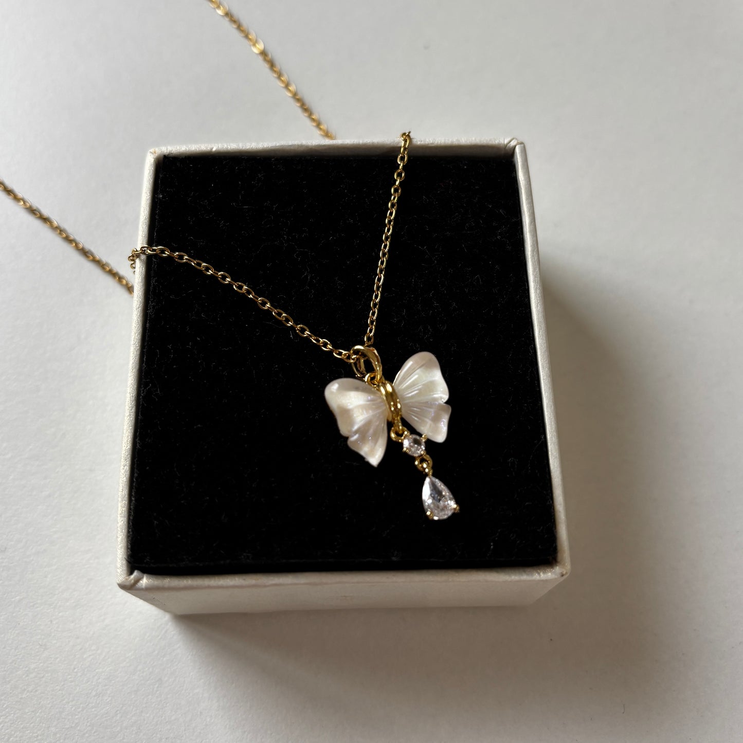 Bow & Beyond Pendant Necklace
