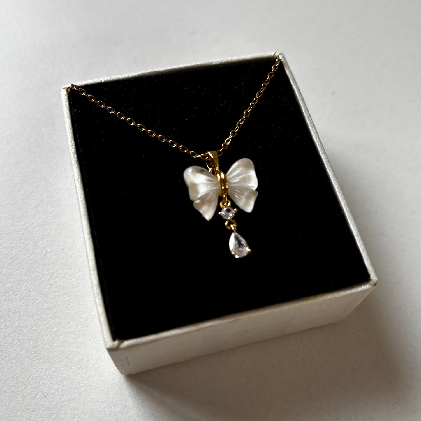 Bow & Beyond Pendant Necklace